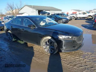 2021 Mazda Mazda6 Touring with VIN JM1GL1VM5M1613920, listed as a IAAI auction lot 41115190 with 56,823 mi miles. Bid and sale history available at carsss.com. Image 1.