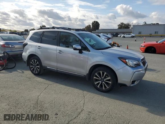 2017 Subaru Forester Touring с VIN JF2SJGWC3HH584750, выставлен на аукционе Copart как лот 54520155 с пробегом 96 839 миль миль и Списание • Salvage title. История ставок и продаж доступна на DreamBid. Изображение 4.