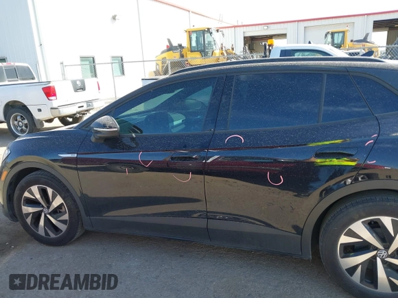 2023 Volkswagen ID.4 Pro with VIN 1V2CMPE82PC008195, listed as a IAAI auction lot 41828830 with 32,336 mi miles and . Bid and sale history available at DreamBid. Image 14.