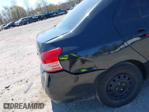 2009 Toyota Yaris with VIN JTDBT903294057773, listed as a IAAI auction lot 42071027 with 164,128 mi miles. Bid and sale history available at carsss.com. Image 13.