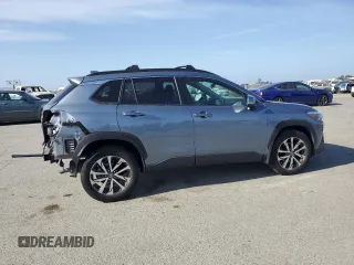 2022 Toyota Corolla Cross XLE с VIN 7MUDAAAG0NV030559, выставлен на аукционе Copart как лот 54075315 с пробегом 28 557 миль миль и Списание • Salvage title. История ставок и продаж доступна на DreamBid. Изображение 3.