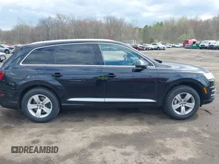2019 Audi Q7 Premium with VIN WA1AHAF74KD034469, listed as a IAAI auction lot 42037259 with 92,404 mi miles and . Bid and sale history available at DreamBid. Image 13.