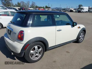 2010 MINI Hardtop with VIN WMWMF3C59ATZ66563, listed as a IAAI auction lot 42098521 with 153,734 mi miles and . Bid and sale history available at DreamBid. Image 4.