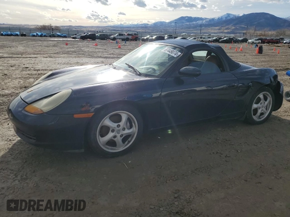 1998 Porsche Boxster z VIN WP0CA2987WU626225, wystawiony jako Copart lot #87449074 z przebiegiem 122 804 mil mil oraz Czysty tytuł • Clean title. Historia ofert i sprzedaży dostępna na DreamBid. Obrazek 1.