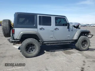2014 Jeep Wrangler Unlimited Rubicon X with VIN 1C4BJWFG2EL308077, listed as a Copart auction lot 54439265 with 160,746 mi miles and Salvage title. Bid and sale history available at DreamBid. Image 3.
