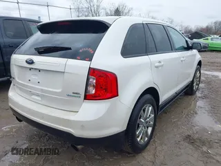2013 Ford Edge SEL with VIN 2FMDK3J93DBB16822, listed as a IAAI auction lot 41995178 with 242,376 mi miles. Bid and sale history available at carsss.com. Image 4.