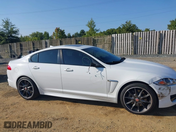 2015 Jaguar XF V6 Portfolio with VIN SAJWJ0FF4F8U72149, listed as a IAAI auction lot 40386903 with 49,055 mi miles. Bid and sale history available at carsss.com. Image 13.