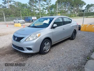 2014 Nissan Versa SV with VIN 3N1CN7APXEK453063, listed as a IAAI auction lot 42163061 with 176,437 mi miles. Bid and sale history available at carsss.com. Image 2.