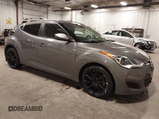 2016 Hyundai Veloster with VIN KMHTC6ADXGU272594, listed as a IAAI auction lot 42437409 with 91,620 mi miles and . Bid and sale history available at DreamBid. Image 1.