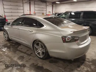 2015 Chevrolet Impala LT with VIN 2G1125S34F9277731, listed as a IAAI auction lot 41835811 with 102,628 mi miles and . Bid and sale history available at DreamBid. Image 3.