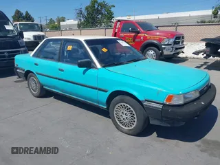 1988 Toyota Camry z VIN JT2SV21E8J3188839, wystawiony jako IAAI lot #42148732 z przebiegiem 184 177 mil mil oraz . Historia ofert i sprzedaży dostępna na DreamBid. Obrazek 1.