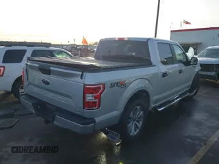 2018 Ford F-150 XL with VIN 1FTEW1EP2JKF28967, listed as a IAAI auction lot 41242743 with 54,171 mi miles. Bid and sale history available at carsss.com. Image 4.