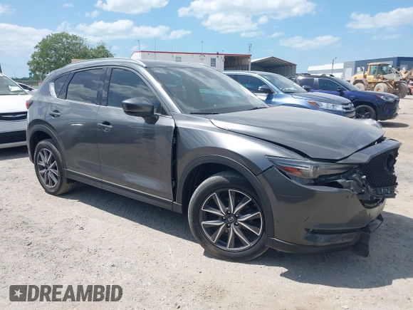 2017 Mazda CX-5 Grand Touring with VIN JM3KFADL3H0227655, listed as a IAAI auction lot 41897981 with 103,545 mi miles. Bid and sale history available at carsss.com. Image 1.