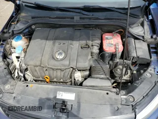2011 Volkswagen Jetta SE with VIN 3VWDX7AJ8BM322833, listed as a Copart auction lot 56546615 with 140,808 mi miles and Salvage title. Bid and sale history available at DreamBid. Image 11.