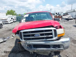 2000 Ford F-250 XL with VIN 1FTNX21L9YED56676, listed as a IAAI auction lot 42390087 with 186,715 mi miles and . Bid and sale history available at DreamBid. Image 13.