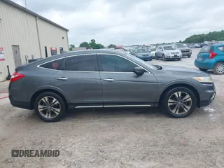 2013 Honda Crosstour EX-L z VIN 5J6TF1H56DL002352, wystawiony jako IAAI lot #42303791 z przebiegiem 178 443 mil mil oraz . Historia ofert i sprzedaży dostępna na DreamBid. Obrazek 13.