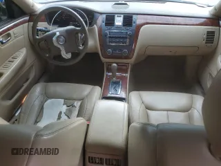 2006 Cadillac DTS 1SC z VIN 1G6KD57Y06U187282, wystawiony jako Copart lot #72627494 z przebiegiem 142 191 mil mil oraz Szkoda całkowita • Salvage title. Historia ofert i sprzedaży dostępna na DreamBid. Obrazek 8.