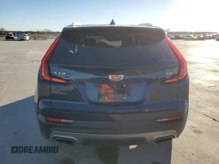 2021 Cadillac XT4 FWD Premium Luxury z VIN 1GYFZCR43MF021302, wystawiony jako Copart lot #41668755 z przebiegiem 46 047 mil mil oraz Szkody całkowita. Historia ofert i sprzedaży dostępna na DreamBid. Obrazek 6.