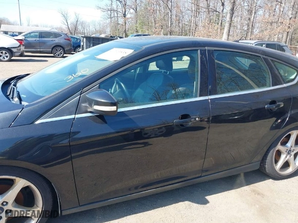 2012 Ford Focus Titanium with VIN 1FAHP3N25CL428522, listed as a IAAI auction lot 41773538 with NaN miles. Bid and sale history available at carsss.com. Image 6.