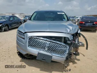 2021 Lincoln Nautilus Standard with VIN 2LMPJ6J97MBL10890, listed as a Copart auction lot 57860015 with 7,052 mi miles and Salvage title. Bid and sale history available at DreamBid. Image 5.