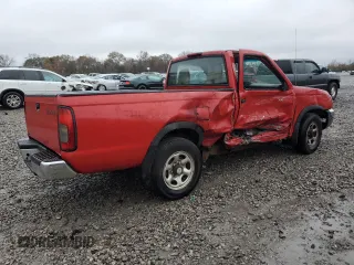 2000 Nissan Frontier XE z VIN 1N6DD21S8YC338304, wystawiony jako Copart lot #83990454 z przebiegiem 184 467 mil mil oraz Szkoda całkowita • Salvage title. Historia ofert i sprzedaży dostępna na DreamBid. Obrazek 3.