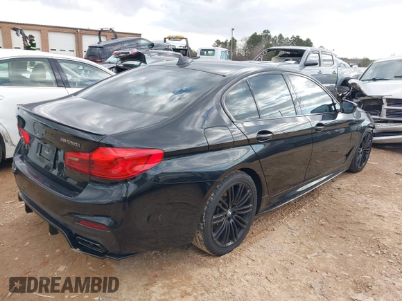 2019 BMW 5 Series M550i xDrive with VIN WBAJB9C56KB464957, listed as a IAAI auction lot 41729334 with Not provided miles and . Bid and sale history available at DreamBid. Image 4.