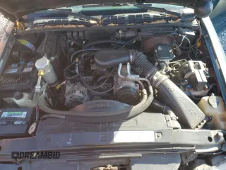 1997 GMC Sonoma SLS with VIN 1GTCS19X2V8528113, listed as a Copart auction lot 48530915 with 214,072 mi miles and Salvage Title. Bid and sale history available at DreamBid. Image 11.