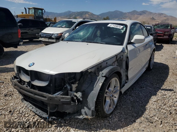 2012 BMW 1 Series 135i with VIN WBAUC9C52CVM12915, listed as a Copart auction lot 67145834 with 114,306 mi miles and Salvage title. Bid and sale history available at DreamBid. Image 1.