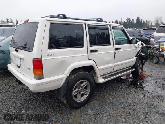 2000 Jeep Cherokee Classic with VIN 1J4FF58S4YL136213, listed as a IAAI auction lot 41227447 with 327,570 mi miles. Bid and sale history available at carsss.com. Image 4.