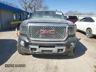 2015 GMC Sierra 2500HD available WiFi Denali with VIN 1GT120E8XFF624844, listed as a Copart auction lot 42063375 with 214,766 mi miles and Salvage Title. Bid and sale history available at carsss.com. Image 5.