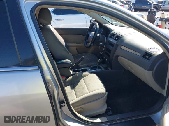 2012 Ford Fusion SE with VIN 3FAHP0HA7CR341742, listed as a IAAI auction lot 41670815 with 211,148 mi miles. Bid and sale history available at carsss.com. Image 5.