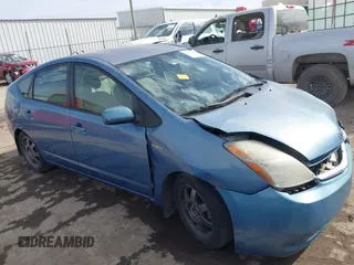2007 Toyota Prius z VIN JTDKB20U677674057, wystawiony jako IAAI lot #41663525 z przebiegiem Nie podano mil oraz . Historia ofert i sprzedaży dostępna na DreamBid. Obrazek 13.