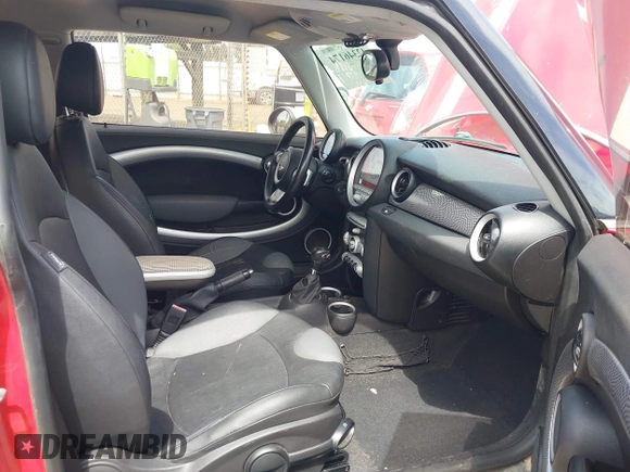 2009 MINI Hardtop S with VIN WMWMF73559TW87548, listed as a IAAI auction lot 42346174 with 132,361 mi miles and . Bid and sale history available at DreamBid. Image 5.