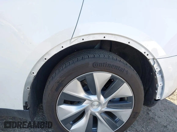2023 Tesla Model Y Long Range z VIN 7SAYGDEE5PF765326, wystawiony jako IAAI lot #41757113 z przebiegiem 10 461 mil mil oraz . Historia ofert i sprzedaży dostępna na DreamBid. Obrazek 24.