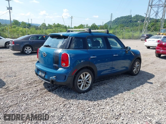 2011 MINI Countryman S with VIN WMWZC5C57BWM11279, listed as a IAAI auction lot 42649621 with 100,000 mi miles and . Bid and sale history available at DreamBid. Image 4.