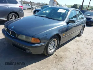 2000 BMW 5 Series 528iA with VIN WBADM6343YGV01651, listed as a IAAI auction lot 41745574 with 143,898 mi miles. Bid and sale history available at carsss.com. Image 17.