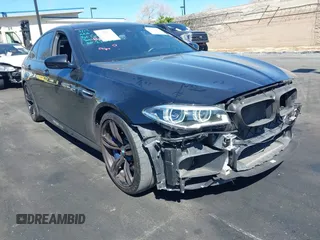 2016 BMW M5 z VIN WBSFV9C56GG343364, wystawiony jako IAAI lot #42000254 z przebiegiem 64 092 mil mil oraz . Historia ofert i sprzedaży dostępna na DreamBid. Obrazek 1.