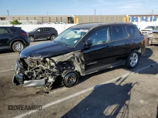 2015 Jeep Compass Sport with VIN 1C4NJDBB8FD282740, listed as a Copart auction lot 74759934 with 173,604 mi miles and Salvage Title. Bid and sale history available at carsss.com. Image 1.
