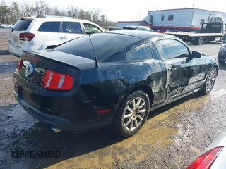 2011 Ford Mustang V6 with VIN 1ZVBP8AM5B5150824, listed as a IAAI auction lot 41539133 with 239,148 mi miles and . Bid and sale history available at carsss.com. Image 4.