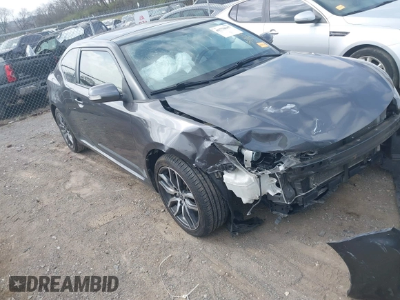 2015 Scion tC z VIN JTKJF5C70FJ013710, wystawiony jako IAAI lot #41770647 z przebiegiem Nie podano mil oraz . Historia ofert i sprzedaży dostępna na DreamBid. Obrazek 1.