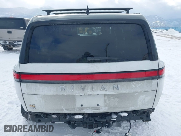 2023 Rivian R1S Adventure z VIN 7PDSGABA9PN015327, wystawiony jako IAAI lot #41484133 z przebiegiem Nie podano mil oraz . Historia ofert i sprzedaży dostępna na DreamBid. Obrazek 17.