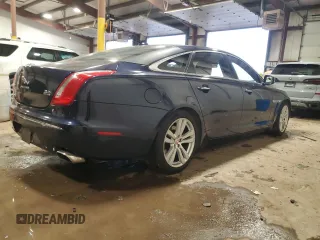 2014 Jaguar XJ Portfolio with VIN SAJWJ2GD7E8V67473, listed as a Copart auction lot 43968705 with 99,146 mi miles and Salvage title. Bid and sale history available at DreamBid. Image 3.