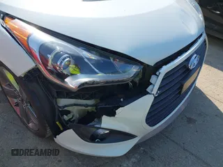 2015 Hyundai Veloster Turbo with VIN KMHTC6AE4FU234611, listed as a IAAI auction lot 42059915 with 107,388 mi miles. Bid and sale history available at carsss.com. Image 6.