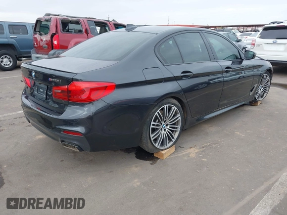2019 BMW 5 Series M550i xDrive with VIN WBAJB9C51KB287797, listed as a IAAI auction lot 41549311 with 61,459 mi miles and . Bid and sale history available at DreamBid. Image 4.