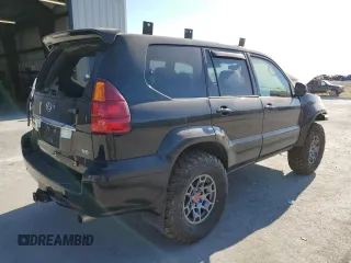 2005 Lexus GX 470 with VIN JTJBT20X650068722, listed as a Copart auction lot 62931984 with 247,819 mi miles and Salvage Title. Bid and sale history available at carsss.com. Image 3.