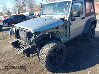 2013 Jeep Wrangler Sport with VIN 1C4AJWAG1DL595509, listed as a IAAI auction lot 41814406 with 59,263 mi miles and . Bid and sale history available at DreamBid. Image 6.