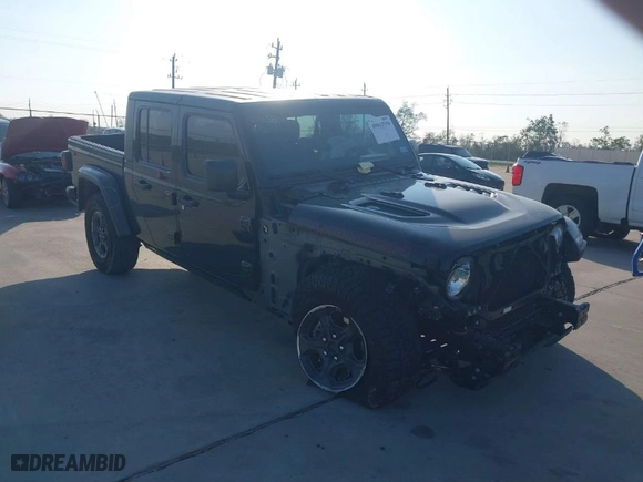 2023 Jeep Gladiator Rubicon with VIN 1C6JJTBGXPL543787, listed as a IAAI auction lot 40963799 with 5,402 mi miles. Bid and sale history available at carsss.com. Image 1.