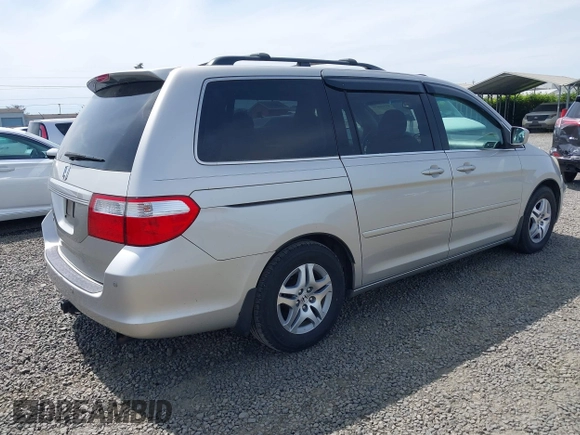 2006 Honda Odyssey EX-L z VIN 5FNRL38786B411187, wystawiony jako IAAI lot #42316075 z przebiegiem 272 658 mil mil oraz . Historia ofert i sprzedaży dostępna na DreamBid. Obrazek 4.