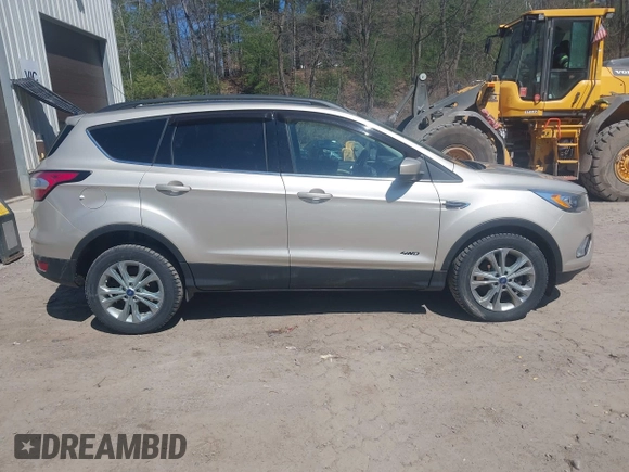2017 Ford Escape SE with VIN 1FMCU9GD1HUD23228, listed as a IAAI auction lot 42074213 with 115,757 mi miles. Bid and sale history available at carsss.com. Image 13.