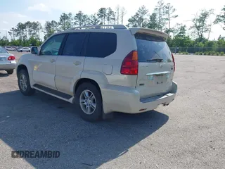 2003 Lexus GX 470 with VIN JTJBT20X630019033, listed as a IAAI auction lot 42128698 with 286,811 mi miles and . Bid and sale history available at DreamBid. Image 3.